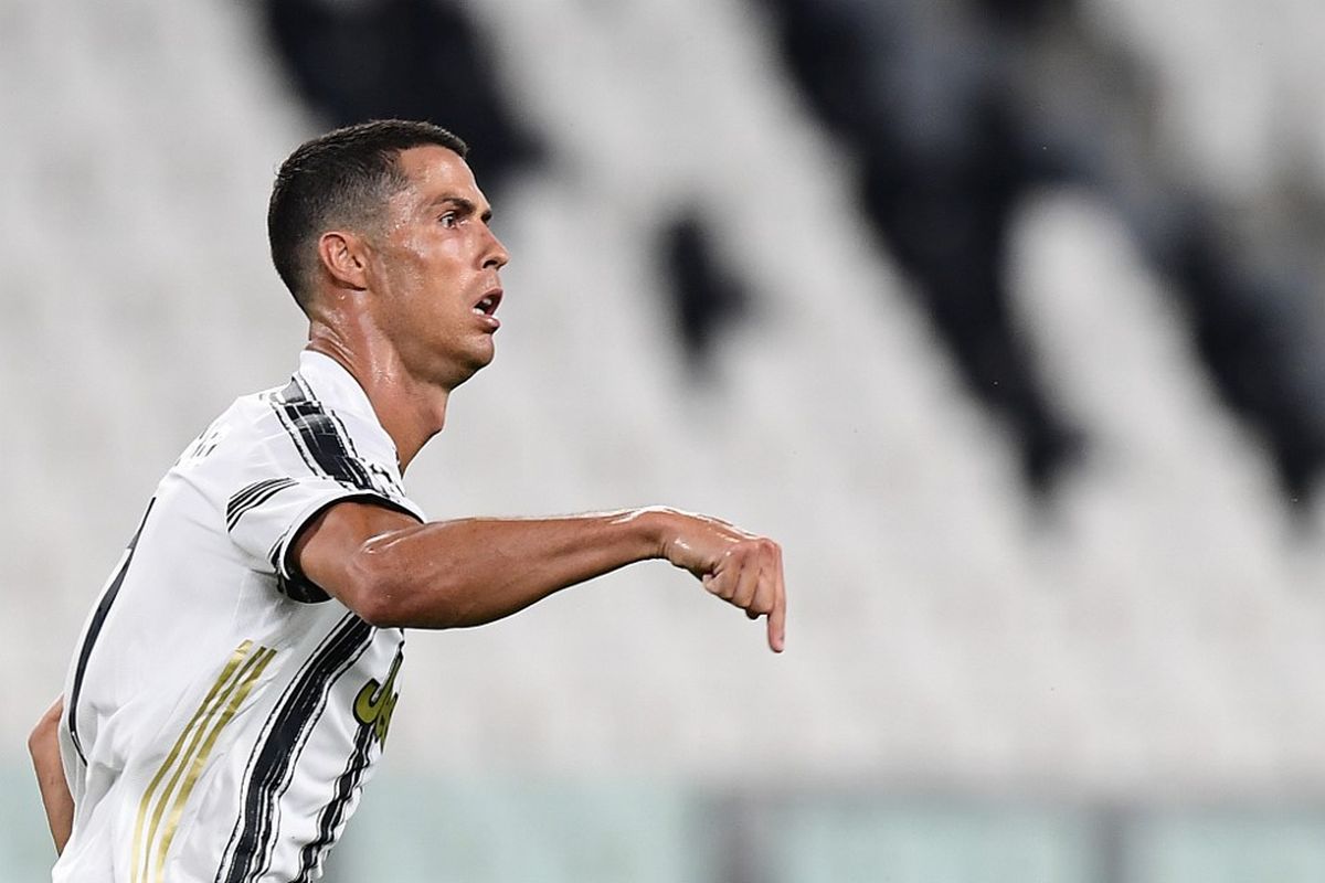 Cristiano Ronaldo melakukan selebrasi usai mencetak gol keduanya pada laga Juventus vs Lyon di Stadion Allianz, Jumat (7/8/2020) atau Sabtu dini hari WIB.
