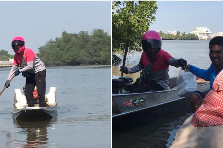 Pengendara Foodpanda rela mengantararkan pesanan makanan kepada pelanggan meski harus menyeberangi sungai dengan perahu kecil di Sungai Bang Pakong di Chachoengsao, Thailand.