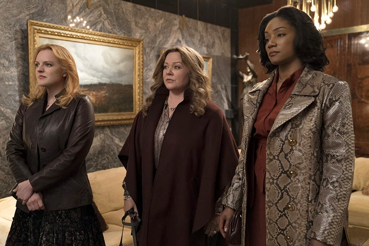 Elisabeth Moss, Melissa McCarthy, dan Tiffany Haddish dalam film drama kriminal The Kitchen (2019).