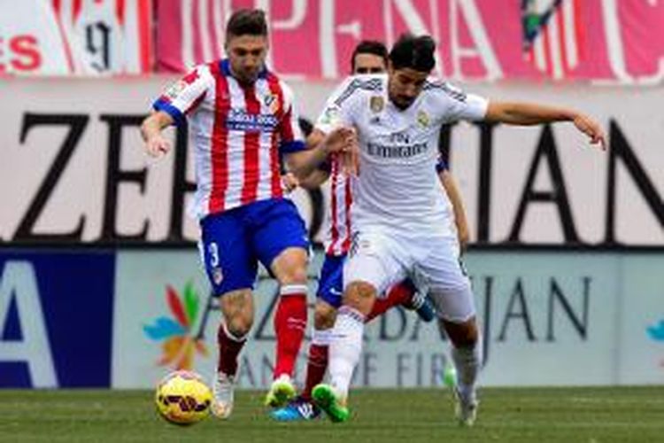 Penampilan gelandang Real Madrid, Sami Khedira, saat melawan Atletico Madrid, Sabtu (7/2/2015). 