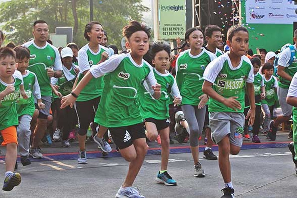 Ratusan anak ikut serta dalam ajang lari MILO Jakarta International 10 K untuk kategori Family Run yang digelar di Rasuna Said pada 23 Juli 2017