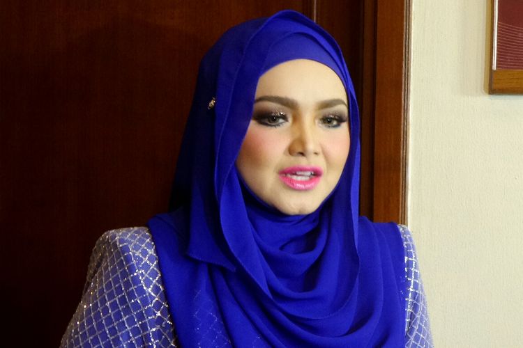Siti Nurhaliza diabadikan di Jakarta Convention Centre, Senayan, Jakarta, Rabu (11/1/2017).