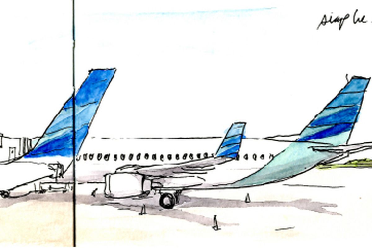 Antrean pesawat Garuda Indonesia menaikkan penumpang di Bandar Udara Soekarno-Hatta menuju Bandar Udara Adisucipto, Yogyakarta.