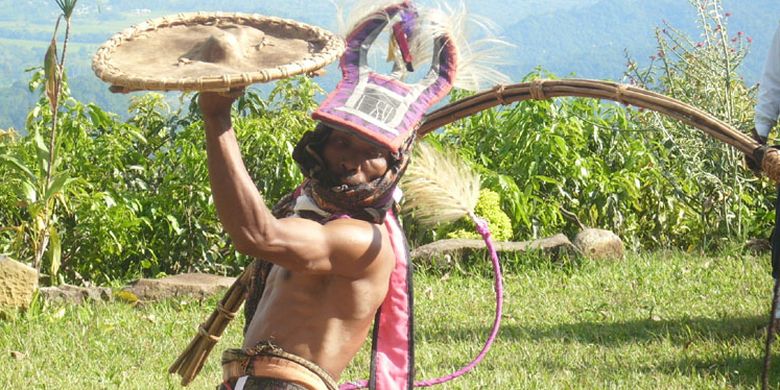 Caci dancer at Melo Cultural Village