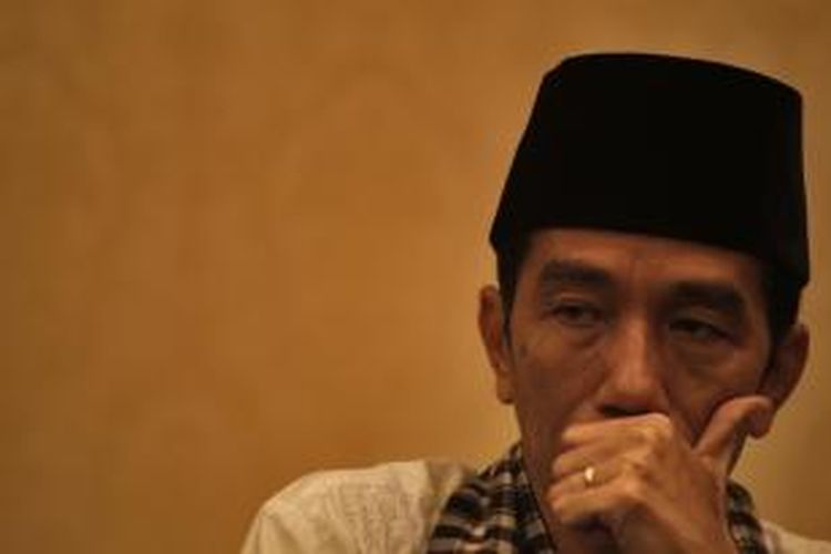 Gubernur DKI Jakarta, Joko Widodo ketika menghadiri rapat koordinasi regional II perumahan dan kawasan permukiman tahun 2013 di Hotel Sultan, Jakarta Selatan, Jumat (15/3/2013).    