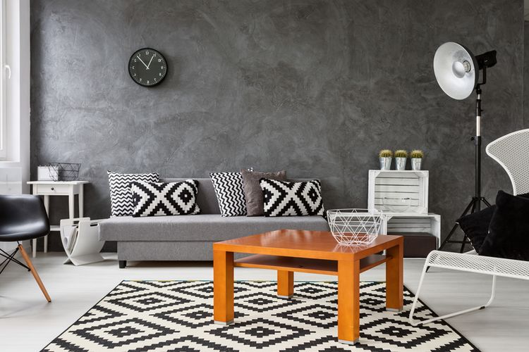 Ilustrasi ruang keluarga dengan nuansa warna hitam, putih, dan abu-abu. 