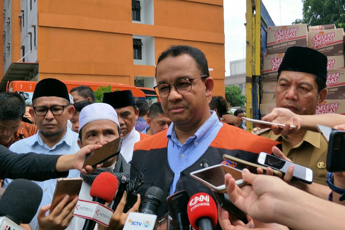 Gubernur DKI Jakarta Anies Baswedan di Rusunawa Rawa Buaya, Cengkareng, Jakarta Barat, Jumat (3/1/2020).