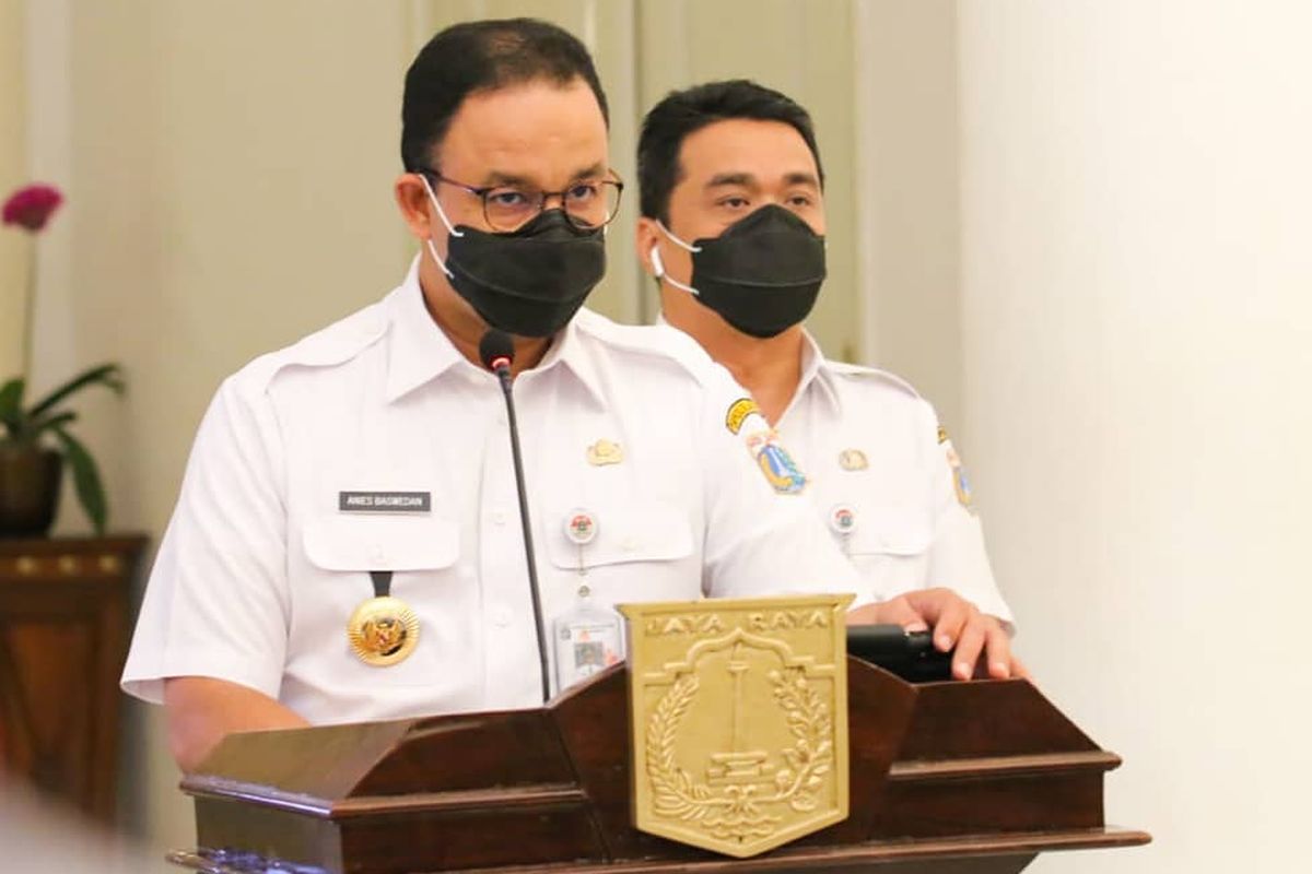 Jakarta Governor Anies Baswedan (left) and Deputy Governor Achmad Riza Patria, announces his decision to reimpose partial lockdown from September 14 to stem the spread of the Covid-19 in the Indonesian capital. 