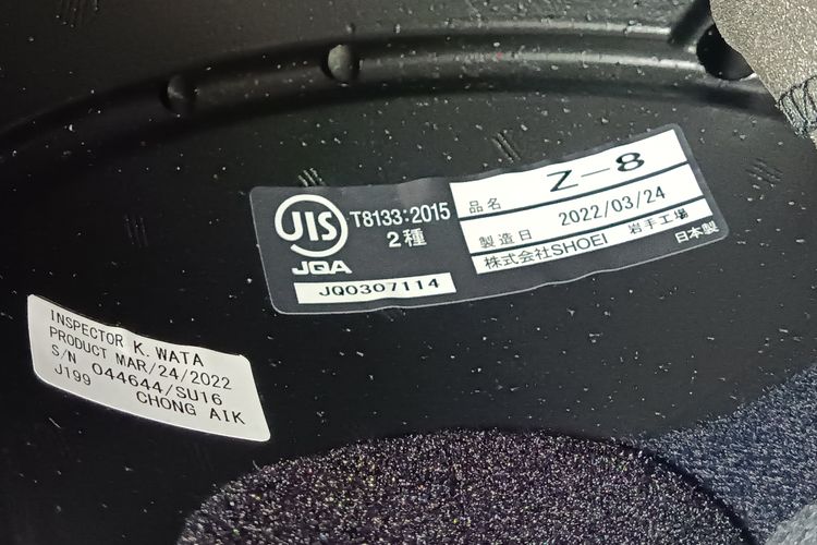 Stiker QC yang ada di EPS helm 