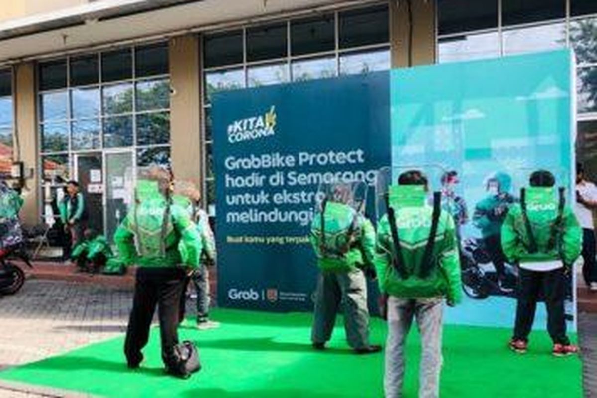 Armada GrabBike Protect dengan dilengkapi partisi plastik.