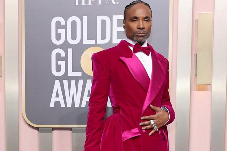 Billy Porter mengenakan gaun tuksedo berwarna pink cerah dari Christian Siriano di Golden Globe 2023