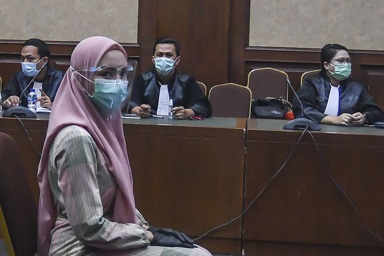 Terdakwa kasus suap pengurusan pengajuan fatwa Mahkamah Agung (MA) untuk membebaskan Djoko Tjandra, Pinangki Sirna Malasari, mengikuti sidang perdana di Pengadilan Negeri Jakarta Pusat, Rabu (23/9/2020). Sidang tersebut beragendakan pembacaan dakwaan dalam kasus dugaan suap dan tindak pidana pencucian uang (TPPU) oleh pihak Jaksa Penuntut Umum.