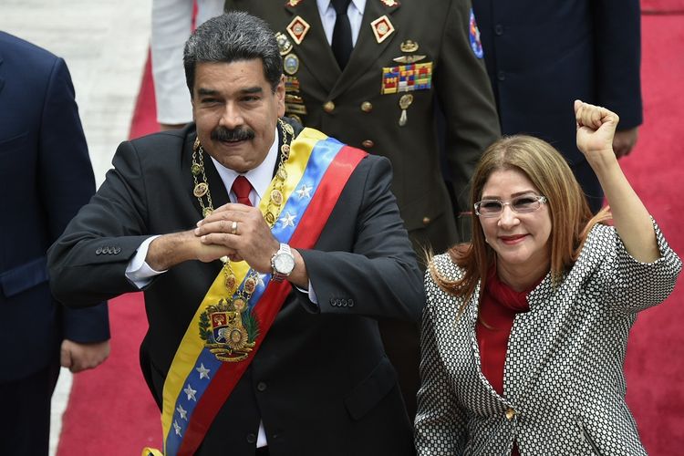 Presiden Venezuela Nicolas Maduro beserta Ibu Negara Cilia Flores hadir dalam upacara penyambutan di Caracas.