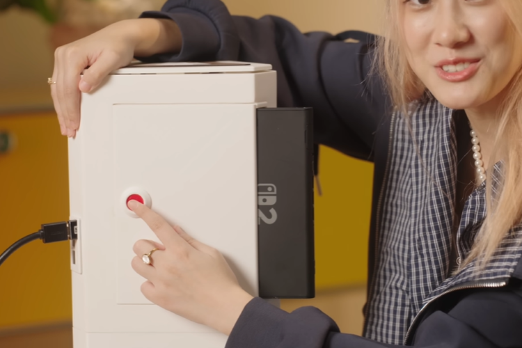 Tombol untuk mengeluarkan konsol Switch 2 dari rumahannya.