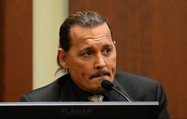 US actor Johnny Depp testifies during his defamation trial in the Fairfax County Circuit Courthouse in Fairfax, Virginia, on April 19, 2022. Depp is suing ex-wife Amber Heard for libel after she wrote an op-ed piece in The Washington Post in 2018 referring to herself as a ?public figure representing domestic abuse.?
JIM WATSON / POOL / AFP