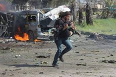 Jurnalis Foto Suriah Berjibaku Selamatkan Bocah Korban Bom