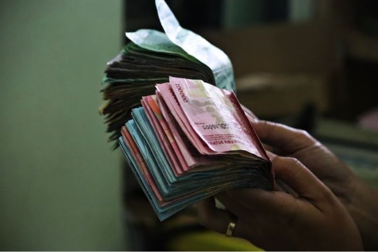 Ilustrasi uang tunai.