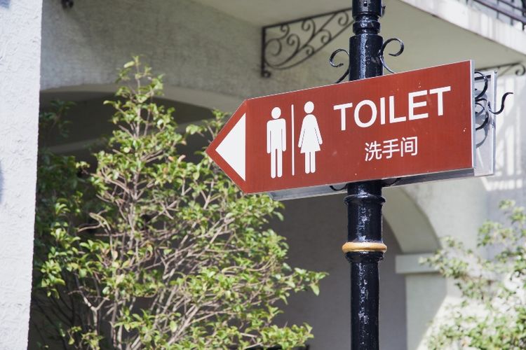 Tanda toilet dalam tulisan China.