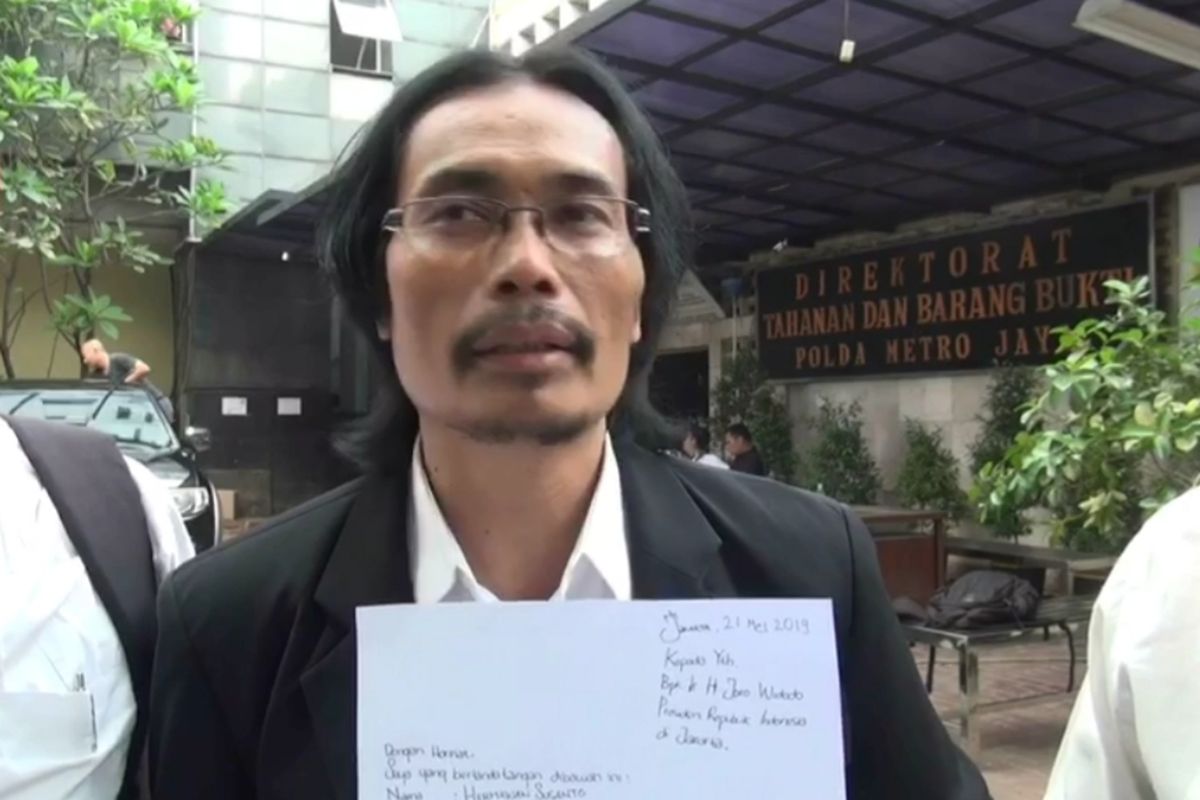 Kuasa hukum HS, Sugiarto Atmowijoyo di Polda Metro Jaya, Selasa (21/5/2019).