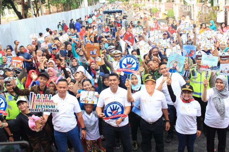 Bupati Fadeli dan Wakil Bupati Kartika Hidayati bersama Kapolres Lamongan AKBP Feby DP Huatagalung, dalam agenda Minggu (20/1/2019).