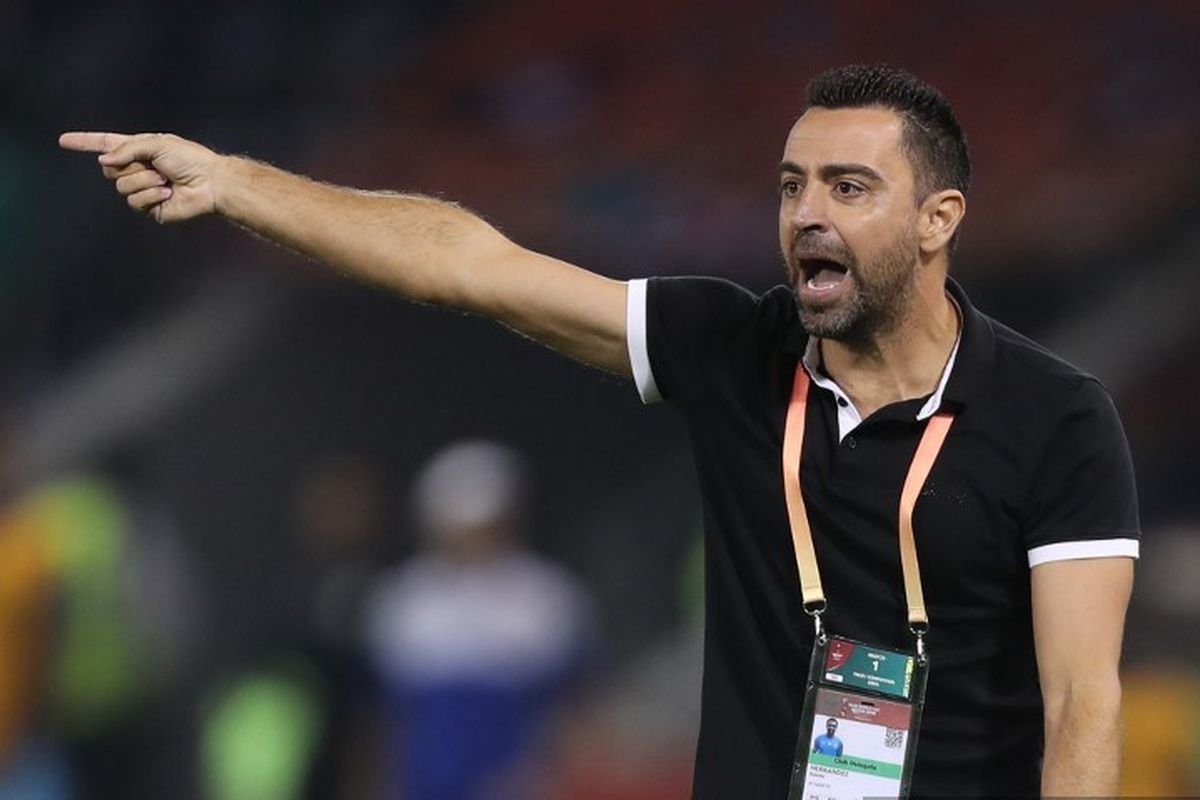 Pelatih Al Sadd, Xavi bereaksi selama pertandingan sepak bola Piala Dunia Klub FIFA 2019 antara Al Sadd Qatar dan Hienghene Sport Kaledonia Baru di Stadion Jassim Bin Hamad