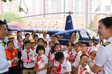 Kirim Helikopter ke Sekolah Anaknya, Pria China Dihujani Kritik