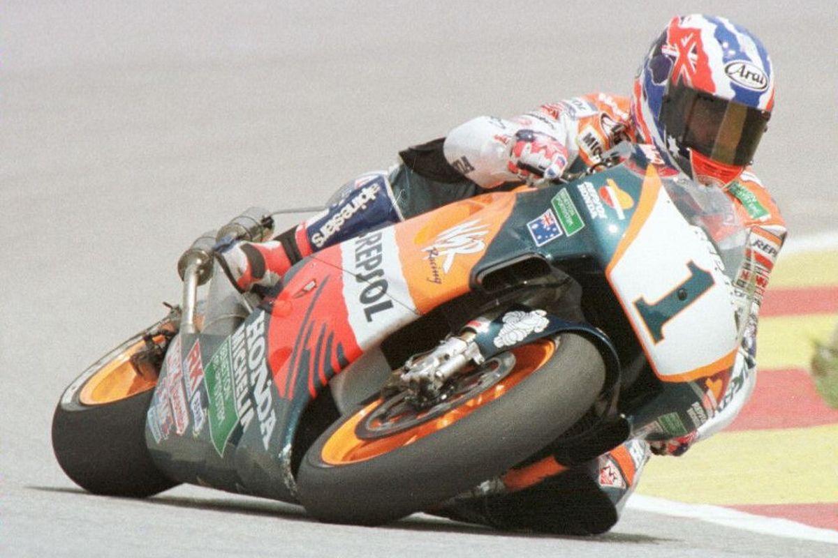 Pebalap legendaris Mick Doohan. (Photo by FRANCIS SILVAN / AFP)