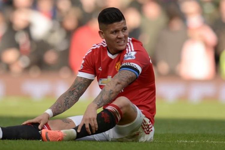 Ekspresi pemain belakang Manchester United, Marcos Rojo, saat timnya melawan Arsenal pada lanjutan Premier League di Stadion Old Trafford, 28 Februari 2016.