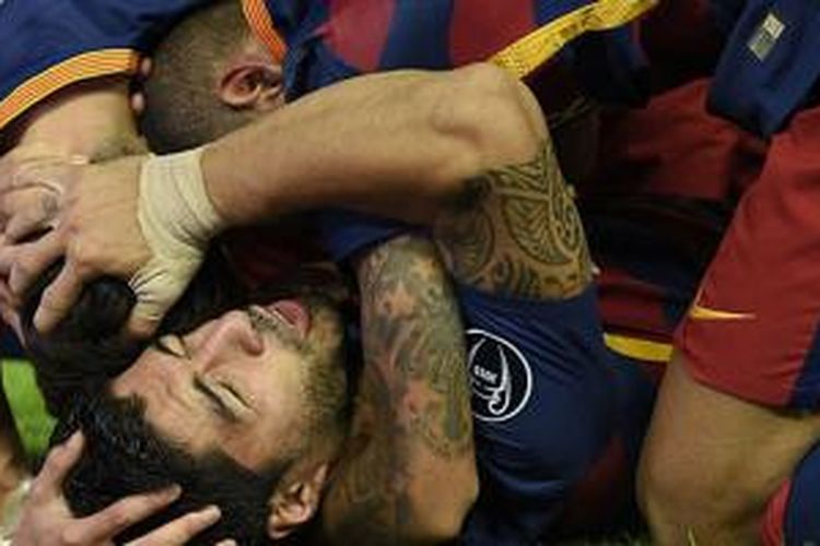 Luis Suarez mencetak gol kemenangan Barcelona atas Bayer Leverkusen di Camp Nou, Selasa (29/9/2015). 