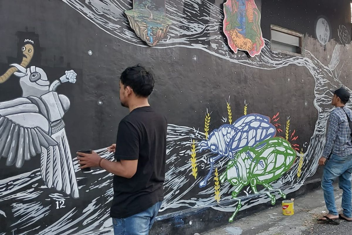 Karya mural Jogja Disability Arts yang berkolaborasi dengan senimal mural Wales