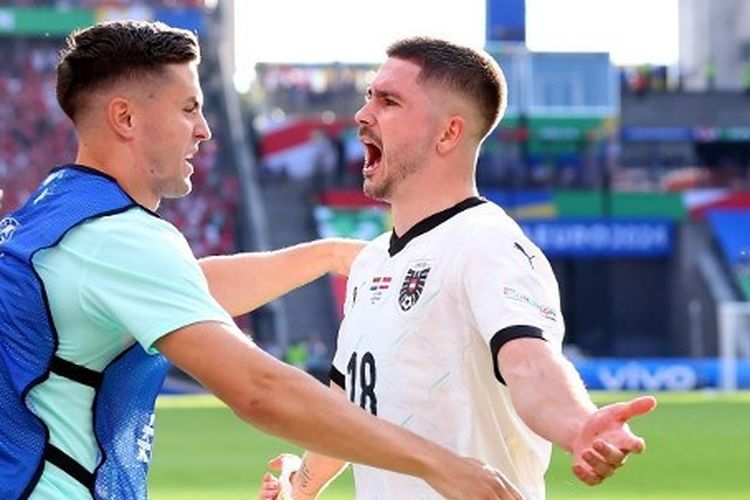 Pemain Austria, Romano Schmid, merayakan golnya seusai membobol gawang Belanda di Olympiastadion, Berlin, pada Selasa (25/6/2024).