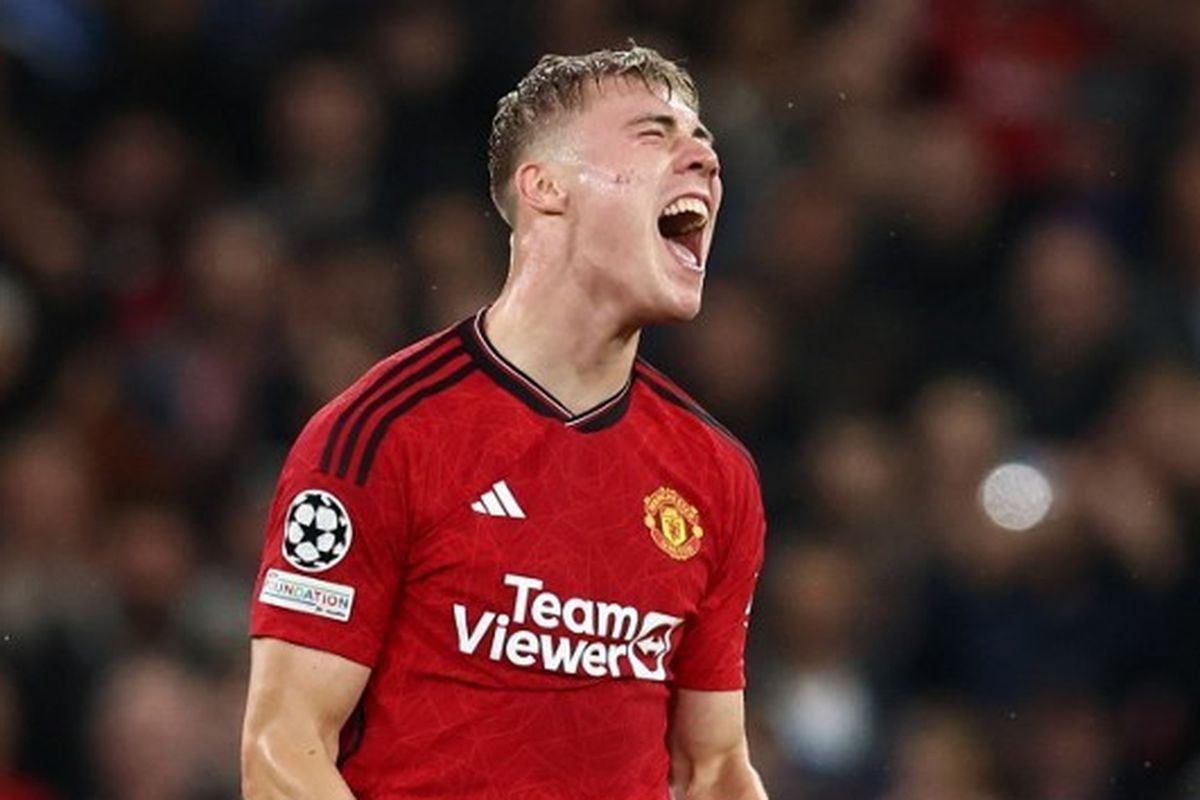 Reaksi striker Manchester United, Rasmus Hojlund, saat berselebrasi seusai mencetak gol di Liga Champions 2023-2024 yang mempertemukan Man United vs Galatasaray di Stadion Old Trafford pada 3 Oktober 2023. Artikel ini berisi daftar top skor Liga Champions. (Foto oleh Darren Staples / AFP)