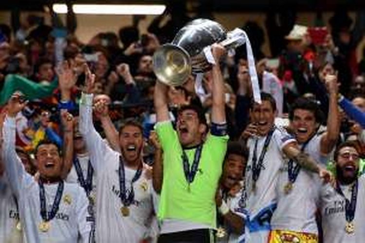 Para pemain Real Madrid merayakan gelar Liga Champions 2013-2014 usai menaklukkan Atletico Madrid 4-1 pada partai final.