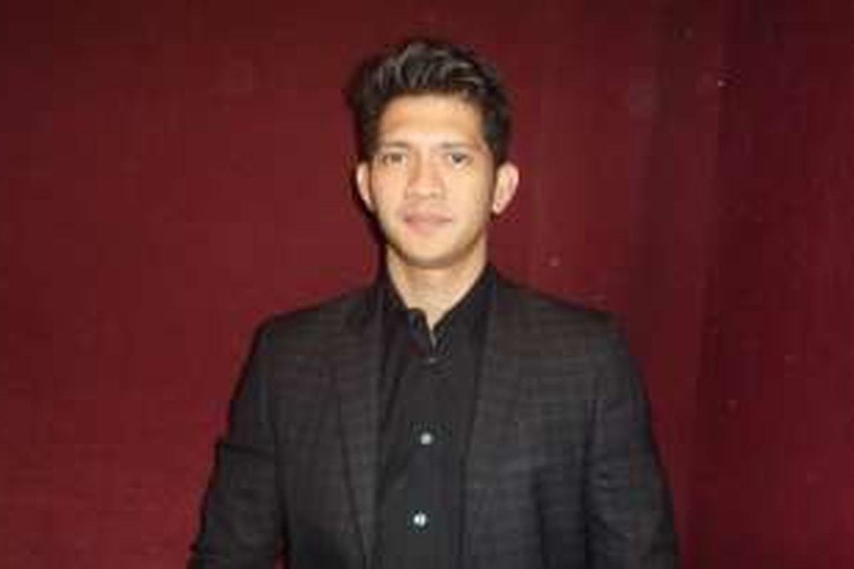 Iko Uwais usai press screening film Headshot di XXI Plaza Senayan, Jakarta Selatan, Kamis (1/12/2016).