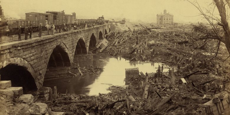 Debris at Pennsylvania Railroad stone bridge, after the Johnstown Flood of May 31, 1889. This was the most horrific site of the disaster. The bridge blocked the onslaught of tons of debris, carried by