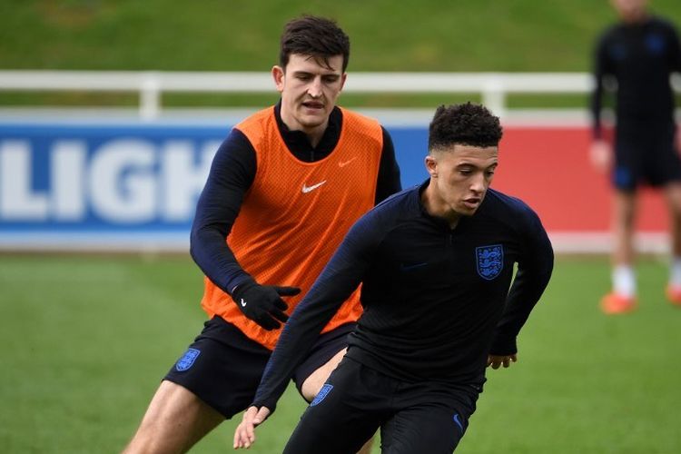 Jadon Sancho dan Harry Maguire berlatih bersama timnas Inggris di St Georges Park, Inggris, pada 19 Maret 2019.