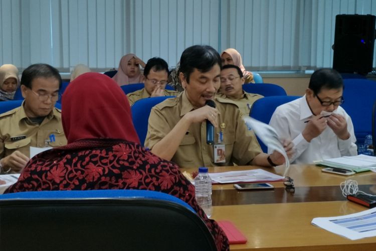 Kepala Badan Pengelola Aset Daerah (BPAD) DKI, Achmad Firdaus saat memberikan paparan dalam rapat road to WTP, Senin (11/12/2017).