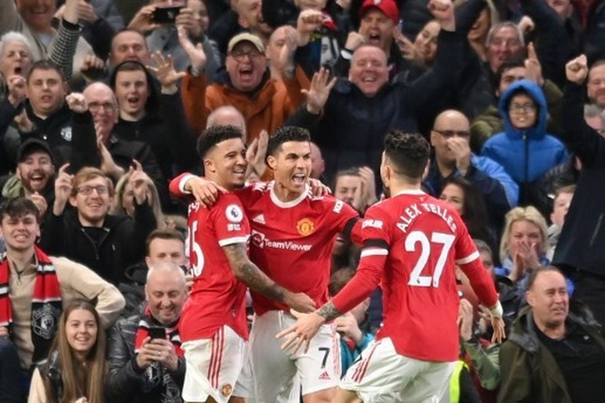 Penyerang Man United Cristiano Ronaldo merayakan gol ke gawang Tottenham Hotspur dalam lanjutan Liga Inggris musim 2021-2022 di Stadion Old Trafford, Minggu (13/3/2022) dini hari WIB.