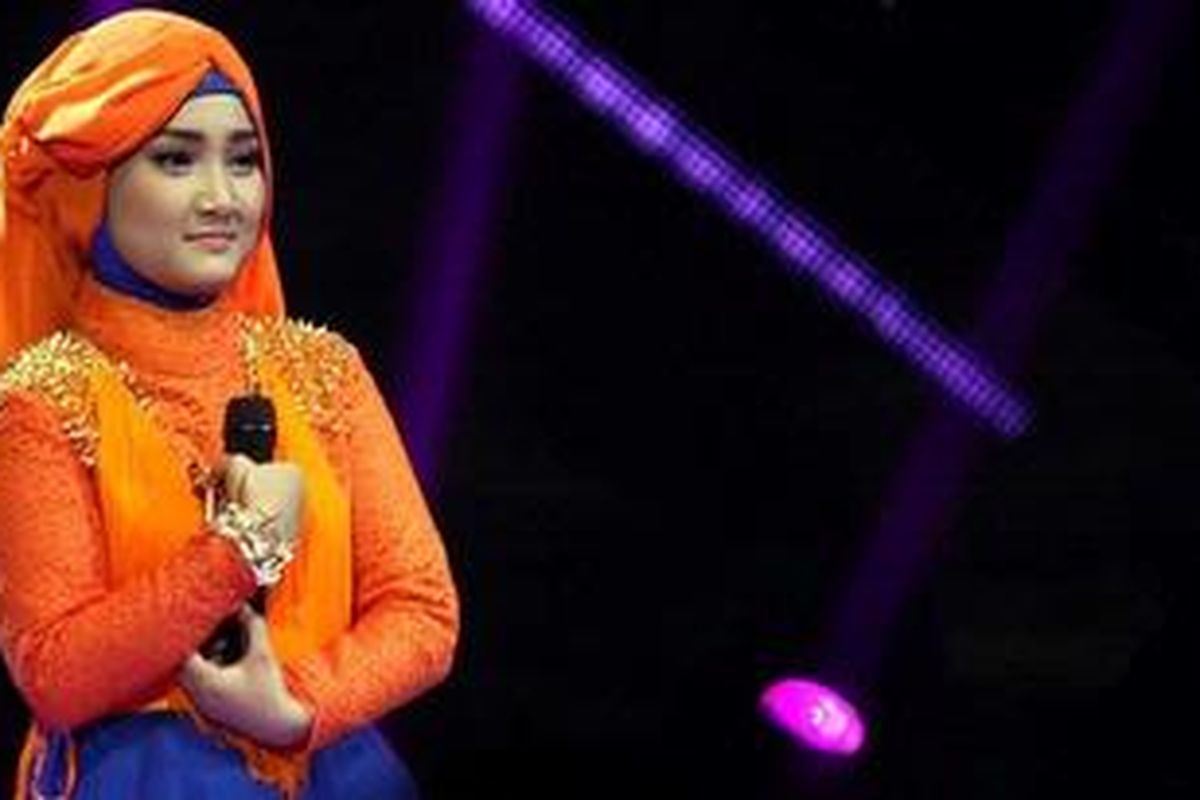 Finalis empat besar X Factor Indonesia, Fatin Shidqia Lubis, tampil pada babak Gala Show (babak eliminasi) ke-11 X Factor Indonesia, yang digelar di Studio 8 RCTI, Kebon Jeruk, Jakarta Barat, Jumat (3/5/2013) malam.