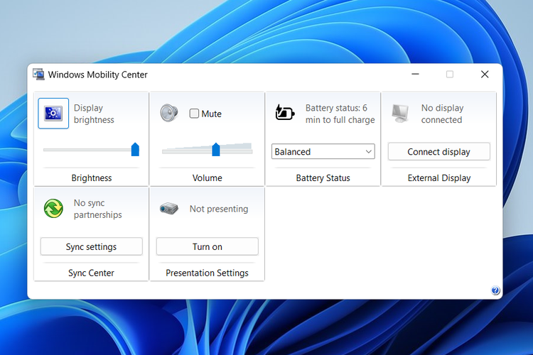 Ilustrasi cara mengatur kecerahan layar laptop Windows 10 lewat Mobility Center.