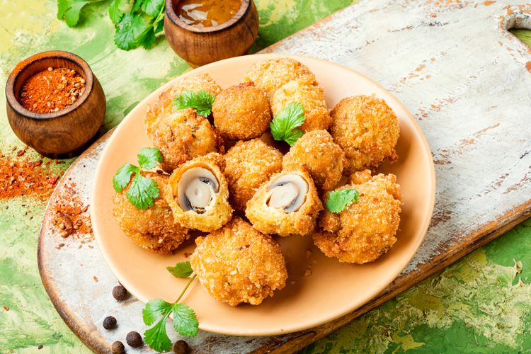 Ilustrasi jamur champignon goreng krispi dengan saus tartar