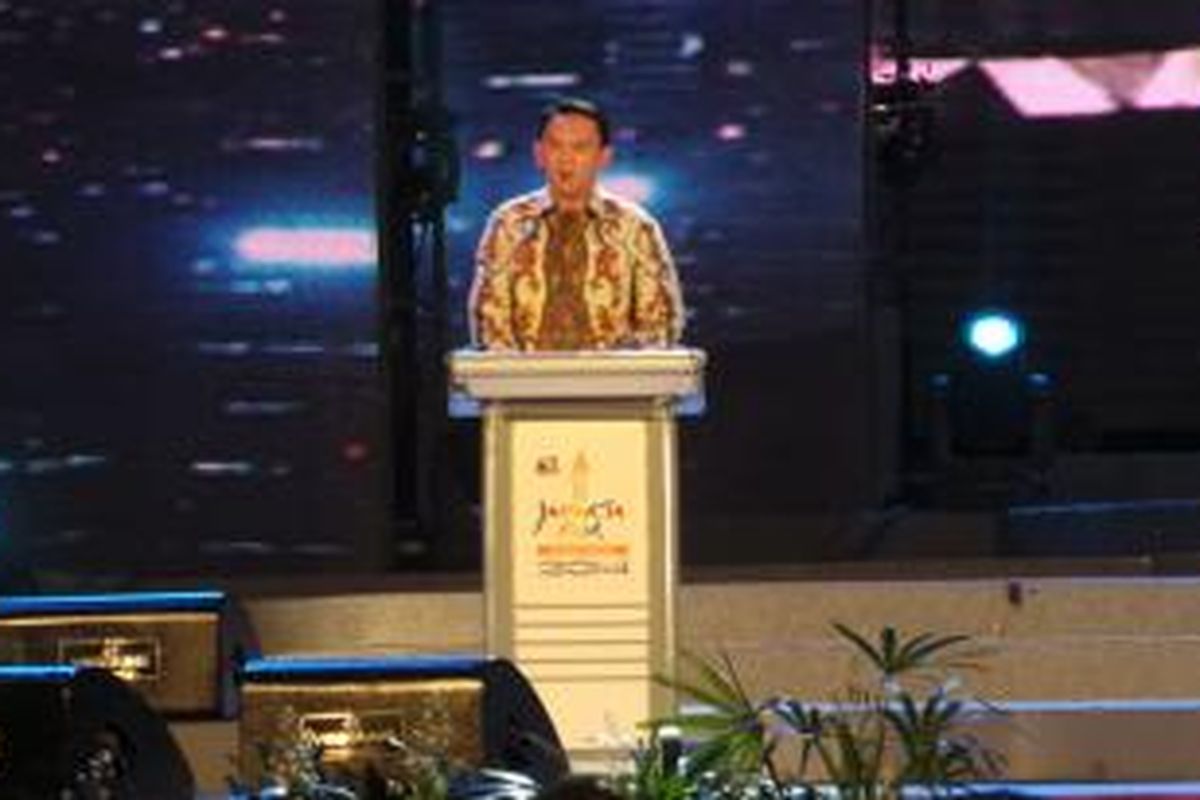 Pelaksana Tugas (Plt) Gubernur DKI Jakarta Basuki Tjahaja Purnama saat memberikan sambutannya dalam pembukaan Jakarta Fair 2014, Arena PRJ Kemayoran, Jakarta, Senin (9/6/2014).