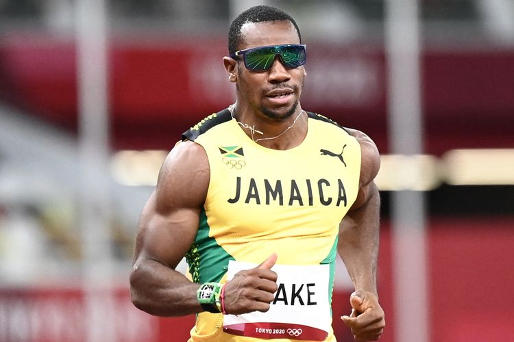 Yohan Blake dari Jamaika yang berada di posisi kedua berkompetisi dalam nomor 100m putra selama Pertandingan Olimpiade Tokyo 2020 di Stadion Olimpiade di Tokyo pada 31 Juli 2021.