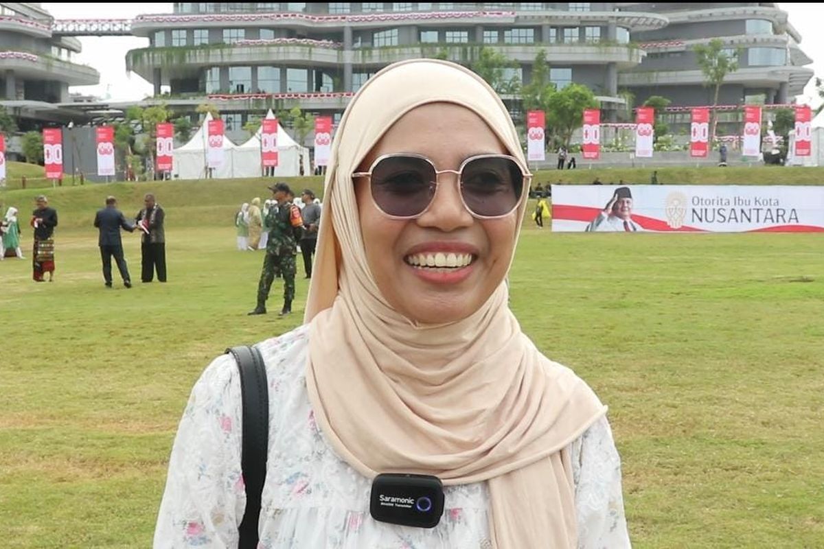 Najmawati, warga Tanah Grogot, Kabupaten Paser, datang sejak subuh mengikuti upacara HUT RI di IKN.