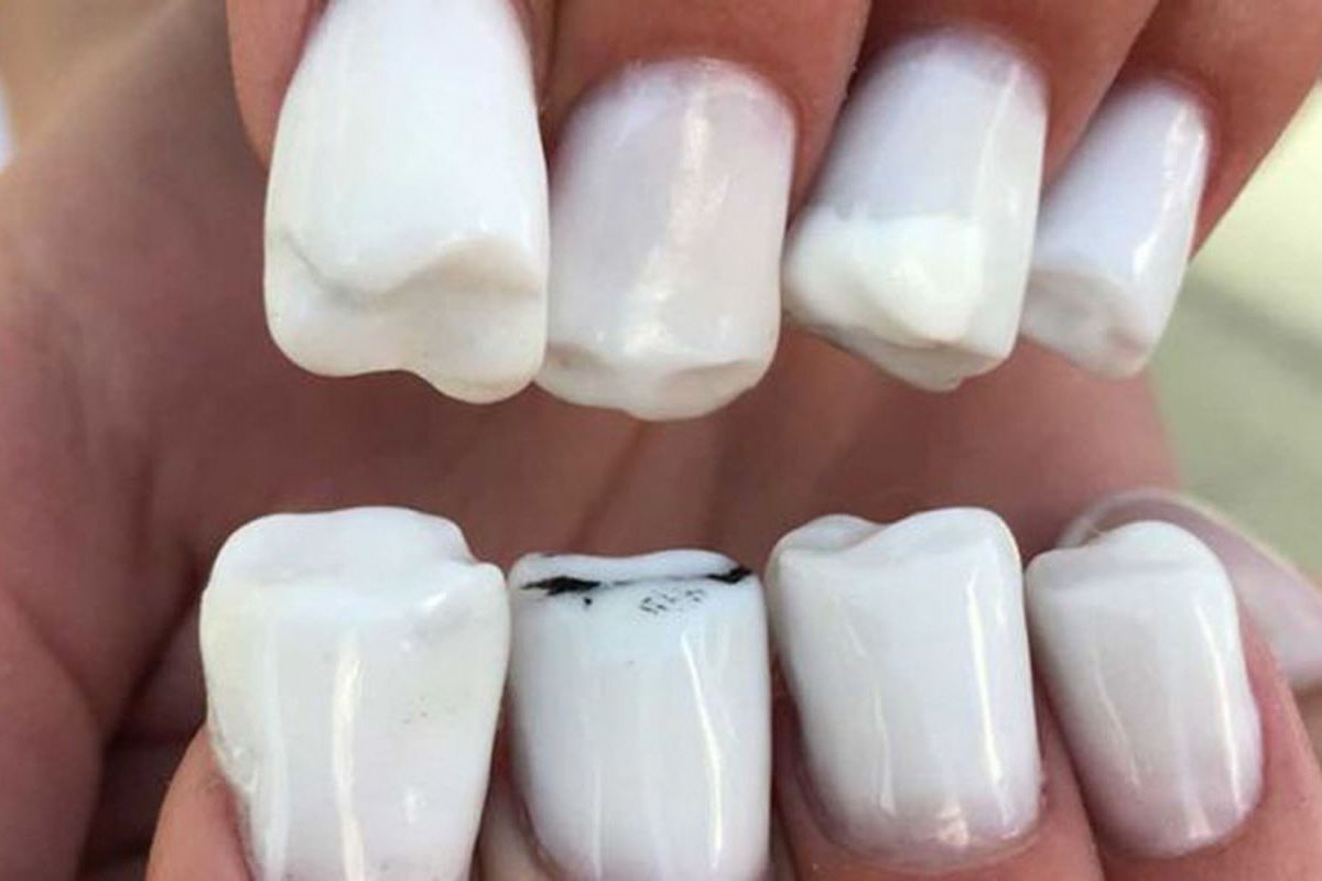 hiasan kuku berbentuk gigi dari nail sunny