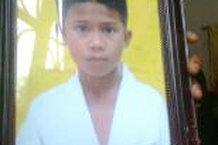 Julpriadi Siagian (10) bocah yang tewas setelah dipatuk ular di rumahnya di Pematangsiantar, Sumatera Utara, Senin (9/2/2015) dini hari.