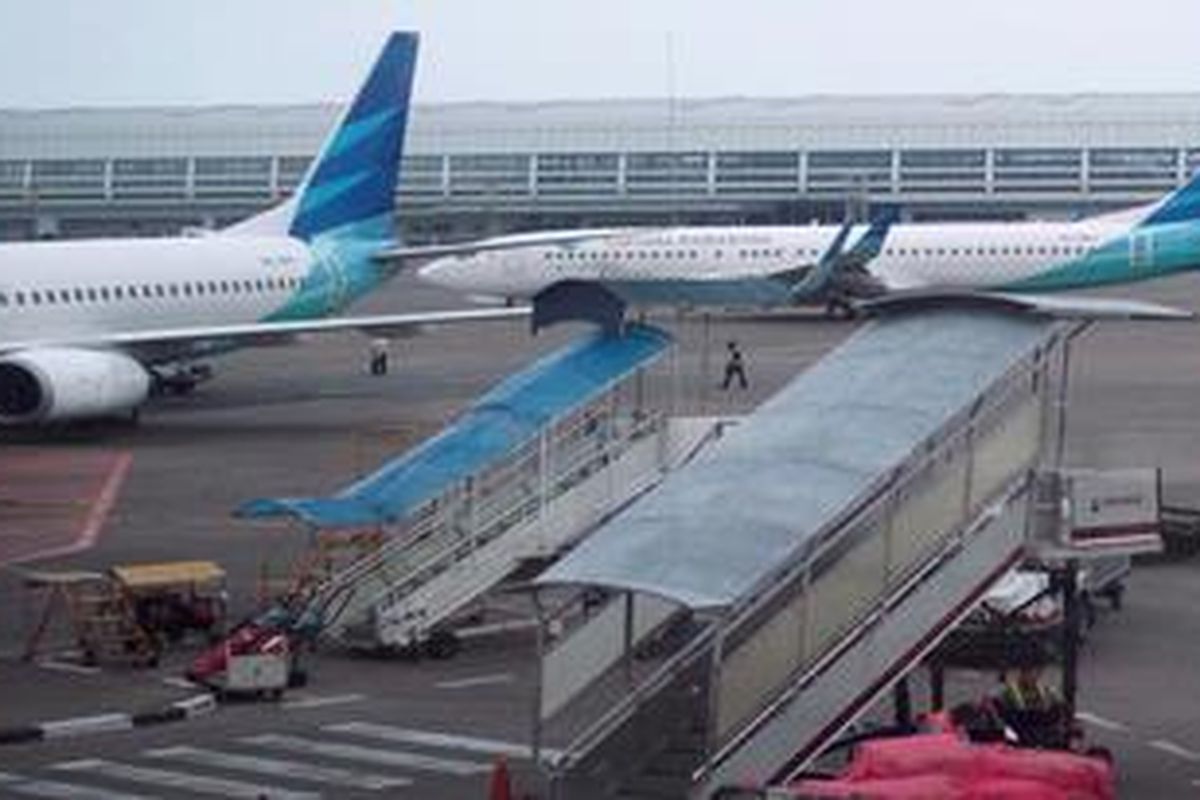 Pesawat Garuda Indonesia siap lepas landas di Bandara Soekarno Hatta, Cengkareng, Banten, Rabu (17/4/2013).