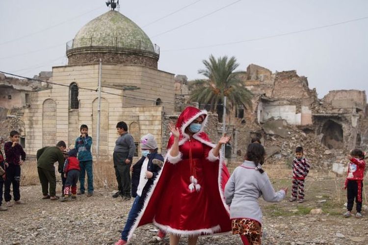 Warga dari berbagai umat beragama hidup berdampingan secara harmonis di Mosul. [Reuters Via BBC Indonesia]