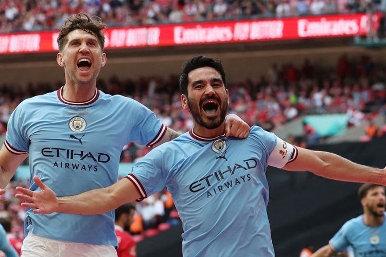 Ekspresi Ilkay Guendogan usai mencetak gol dalam laga final Piala FA 2022-2023 antara Man City vs Man United di Stadion Wembley, 3 Juni 2023. Terkini, Man City akan melawan Inter Milan pada final Liga Champions. Pebalap MotoGP Marc Marquez memprediksi Man City menang 3-1 atas Inter Milan. (Photo by Adrian DENNIS / AFP) / NOT FOR MARKETING OR ADVERTISING USE / RESTRICTED TO EDITORIAL USE