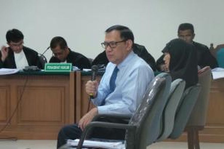 Gubernur Bank Indonesia Agus Martowardojo bersaksi dalam sidang kasus dugaan korupsi proyek Hambalang untuk terdakwa Deddy Kusdinar di Pengadilan Tindak Pidana Korupsi Jakarta, Selasa (10/12/2013).